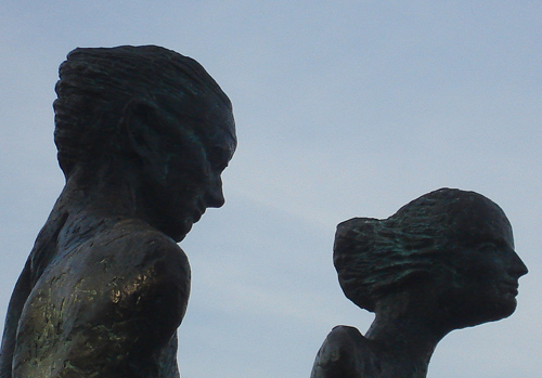 Detail of bronze heads of male and female figures, showing Lautaro Diaz’s passionate expressionism