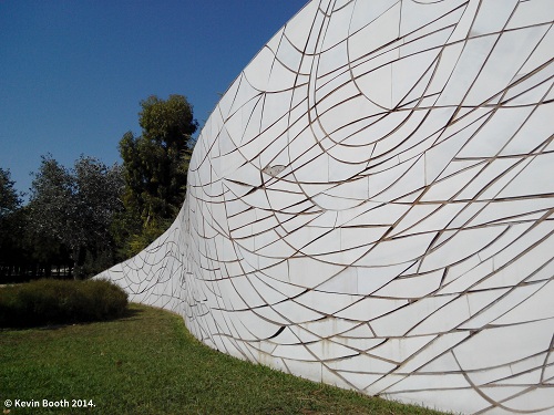 A huge earthworks clad in ceramic tile—a homage to Gaudi’s trencadís style—transforms the landscape.