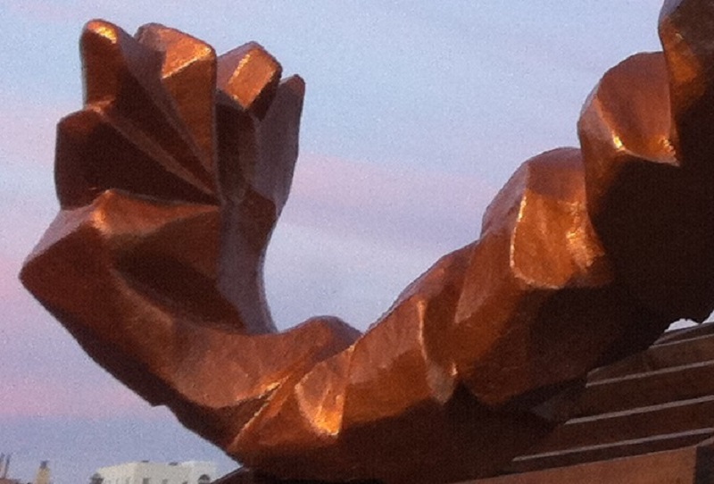 Gambrinus’s sculptural volumes and bronzed patina reflect the lilac and indigo light of a Mediterranean evening beautifully