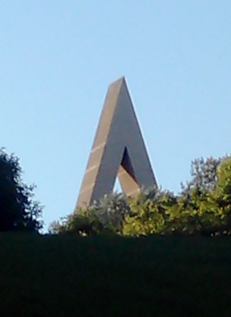 Sited on the crown of the hill to emphasise its height, the capital letter A is the first hint you have that a Brossa work inhabits the vicinity