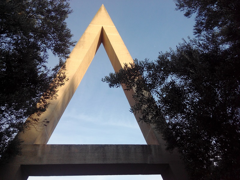 The capital A’s sharp lines erupt from the vegetation like a futurist manifesto