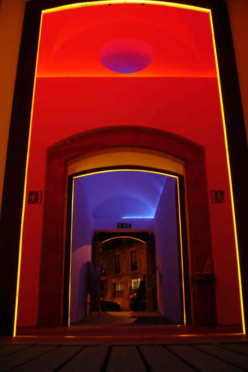 The oculus is an iconic Turell reference, as is his use of neon