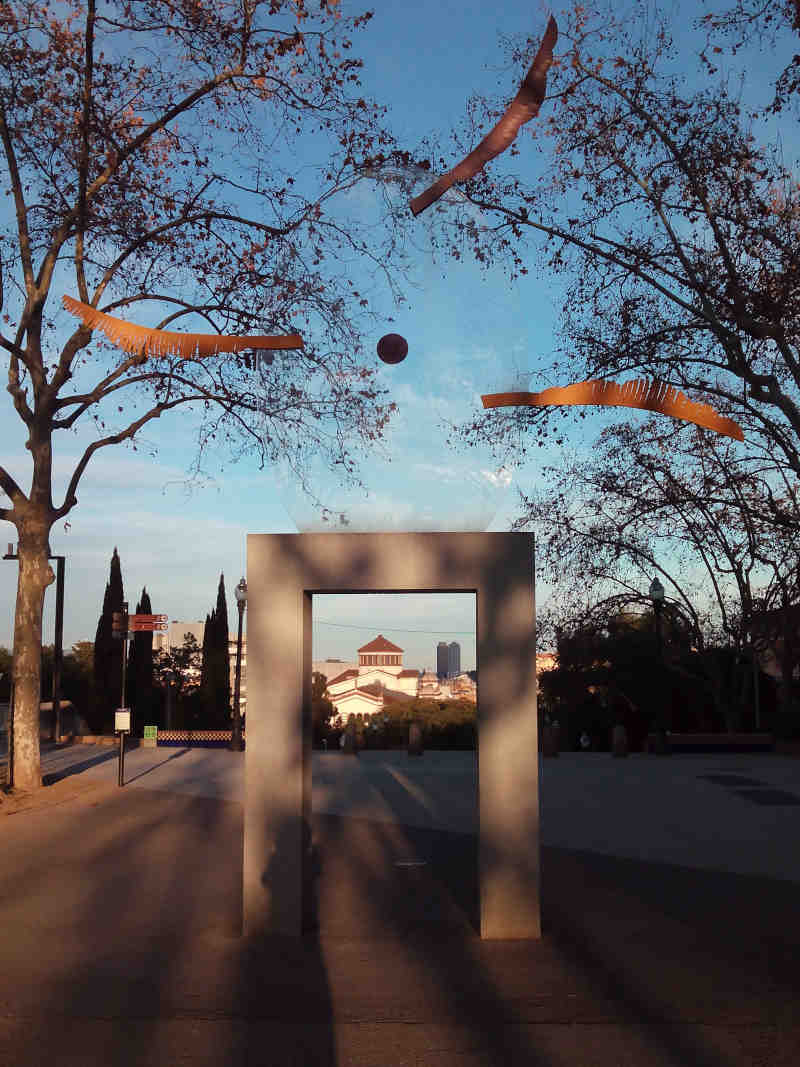 Looking through Silvia Gubern’s installation Feníxia, over Barcelona’s Teatre Lliure and Hotel Arts